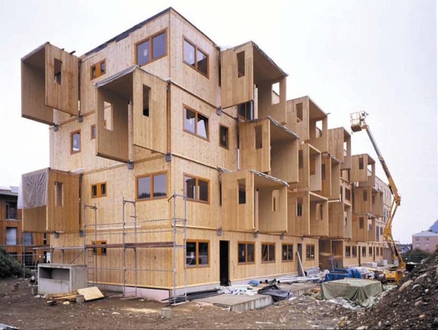 Ossature en bois > Construction de bâtiments avec des panneaux de bois massif